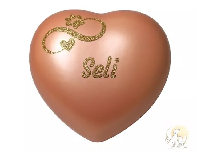 Beispiel Herzurne apricotfarben mit Infinity Pfote-Herz-Motiv Namen Seli in goldfarben