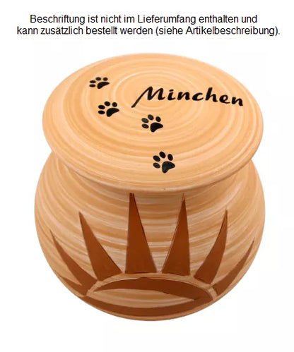 Beispiel einer Folienbeschriftung auf dem Deckel in schwarz mit Namen und Pfotenspur